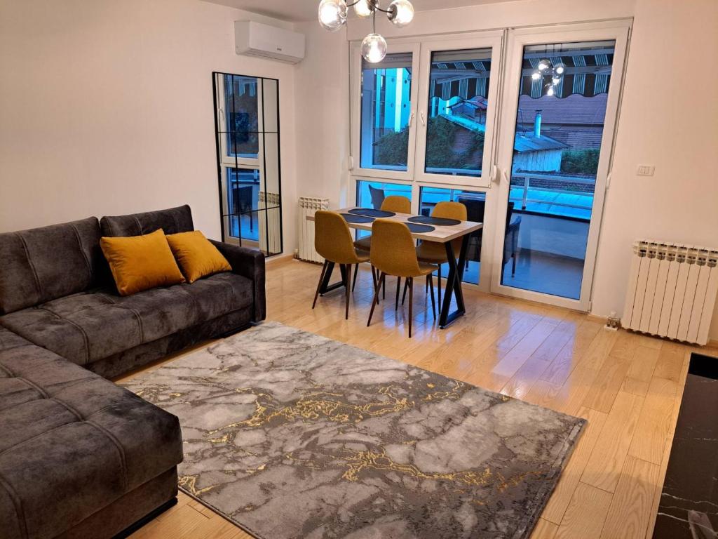 Posezení v ubytování Premier Apartment