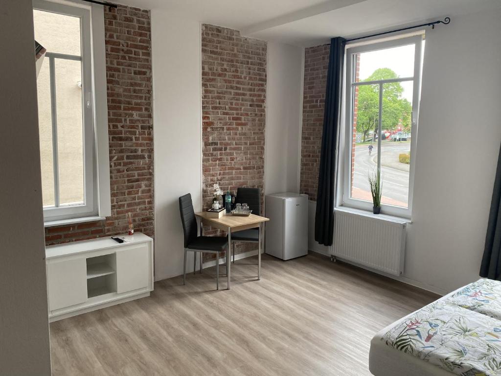 Postel nebo postele na pokoji v ubytování Appartementhaus EMDEN