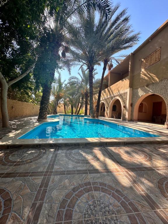 Bazén v ubytování Nour El Waha Hotel nebo v jeho okolí