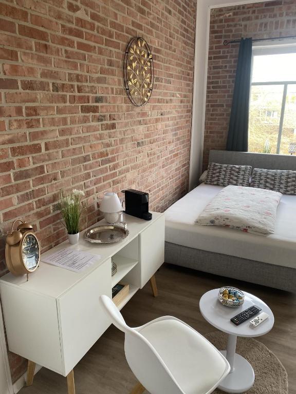 Postel nebo postele na pokoji v ubytování Appartementhaus EMDEN