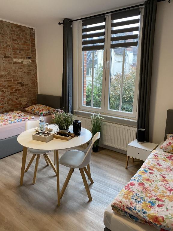 Postel nebo postele na pokoji v ubytování Appartementhaus EMDEN