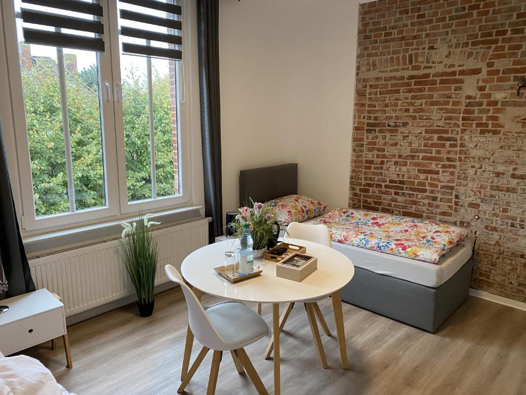Postel nebo postele na pokoji v ubytování Appartementhaus EMDEN