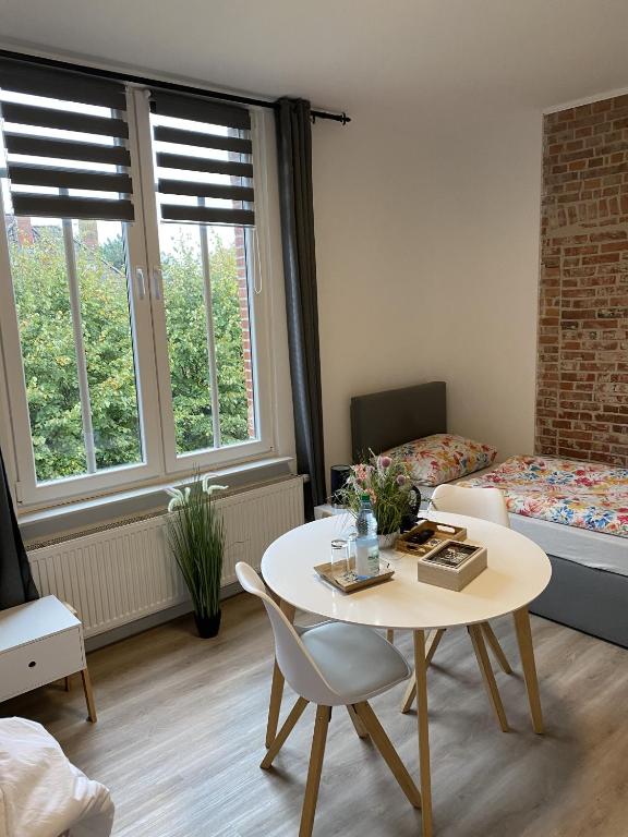 Postel nebo postele na pokoji v ubytování Appartementhaus EMDEN