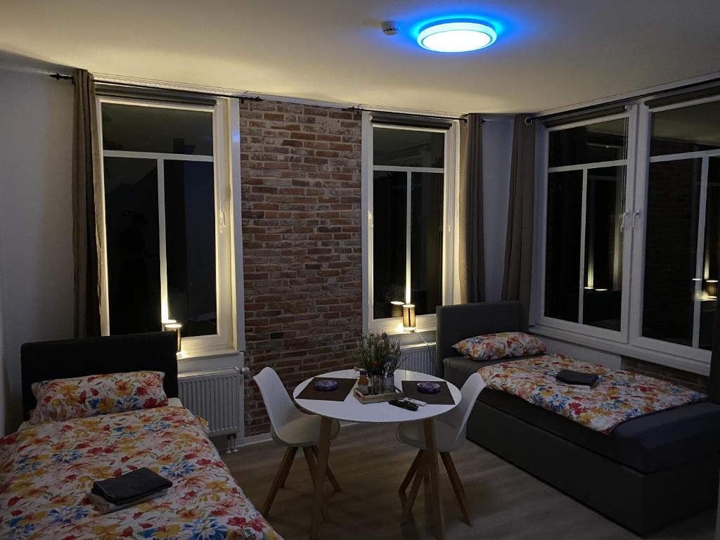 Postel nebo postele na pokoji v ubytování Appartementhaus EMDEN