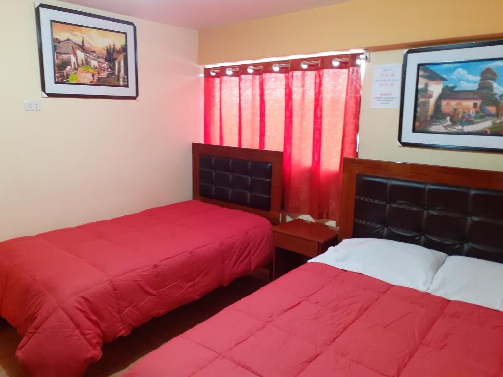 Postel nebo postele na pokoji v ubytování Hostal kuntur cusco