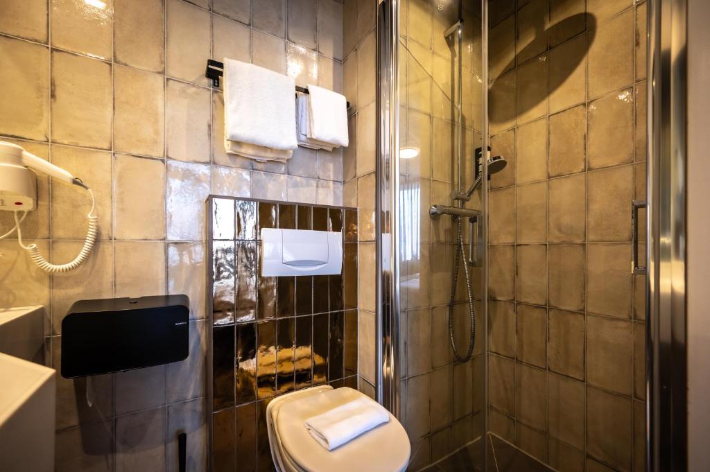 Koupelna v ubytování Hotel Villa Flora