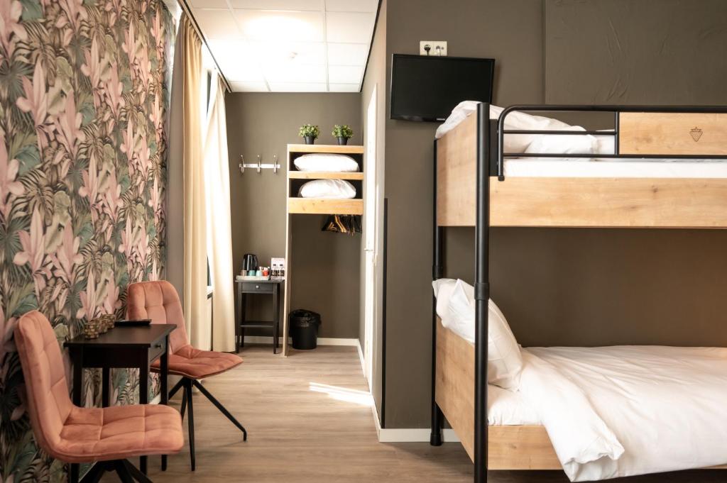 Postel nebo postele na pokoji v ubytování Hotel Villa Flora