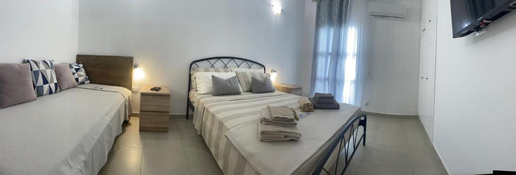 Кровать или кровати в номере Deda Apartments