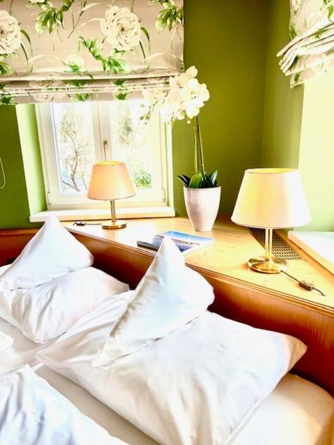 Postel nebo postele na pokoji v ubytování Hotel Fischerhaus