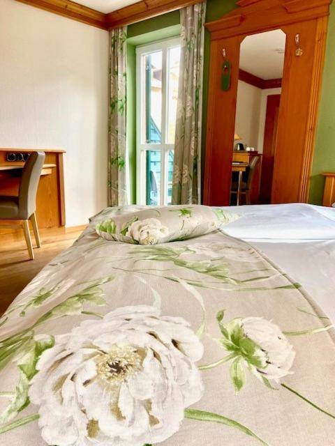 Postel nebo postele na pokoji v ubytování Hotel Fischerhaus