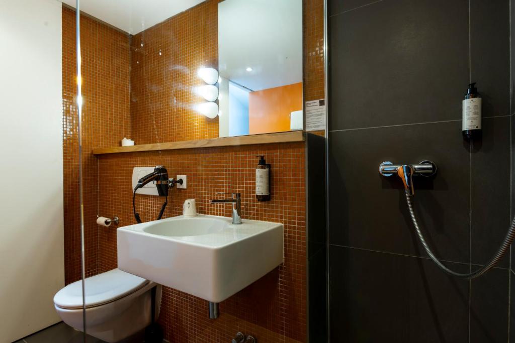 Koupelna v ubytování Hotel Burrhus