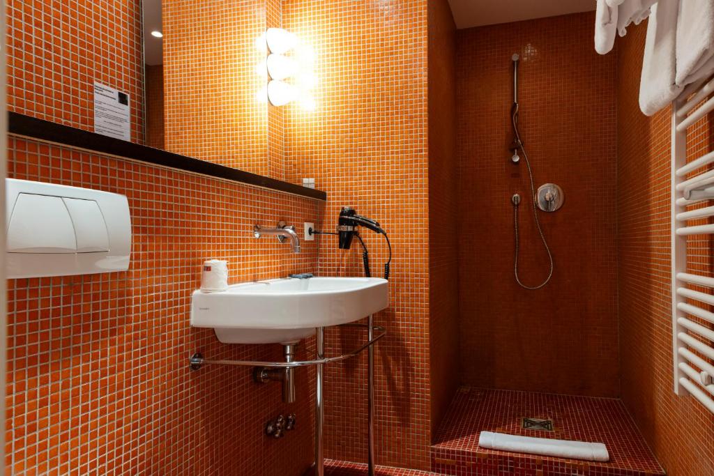 Koupelna v ubytování Hotel Burrhus