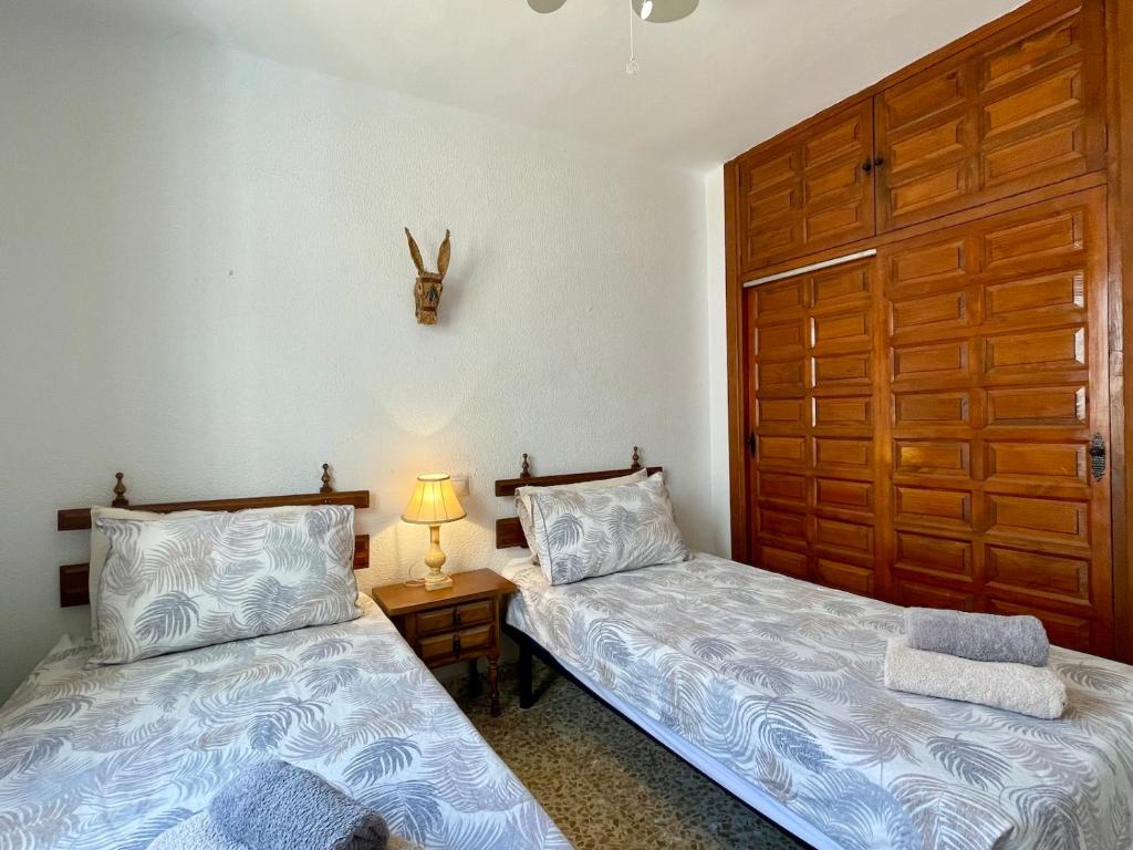 Posteľ alebo postele v izbe v ubytovaní Garden Apartment, La Noria