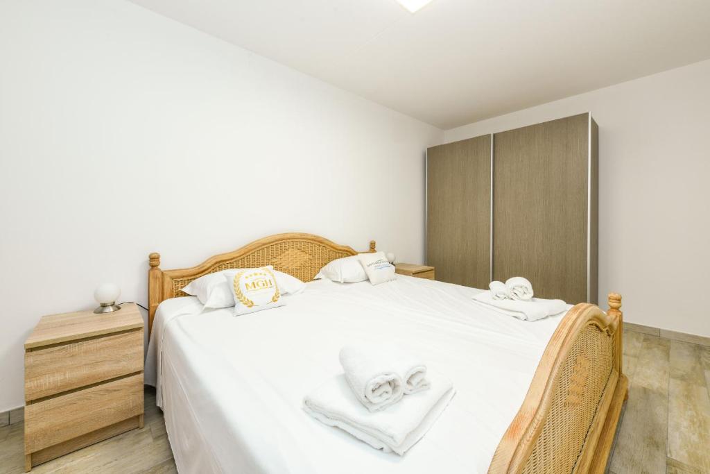 Postel nebo postele na pokoji v ubytování MGH Luxury - Villa Marlene