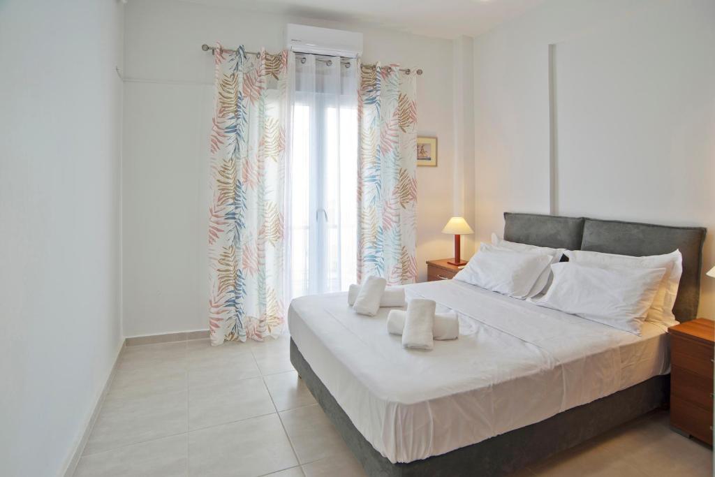 Postel nebo postele na pokoji v ubytování SeaLiv Apartment by LobbySquare