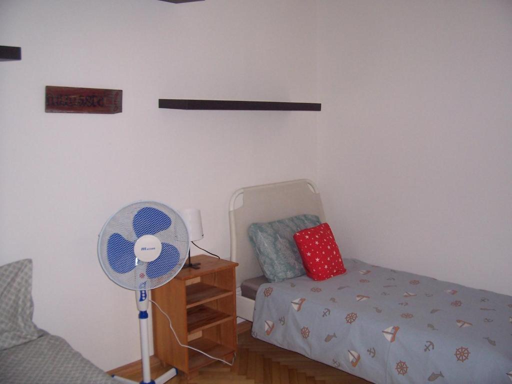 Postel nebo postele na pokoji v ubytování Universal Apartment Budapest