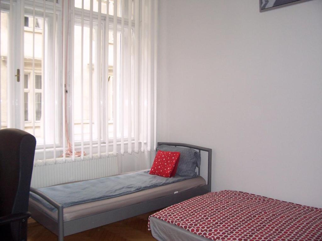 Postel nebo postele na pokoji v ubytování Universal Apartment Budapest