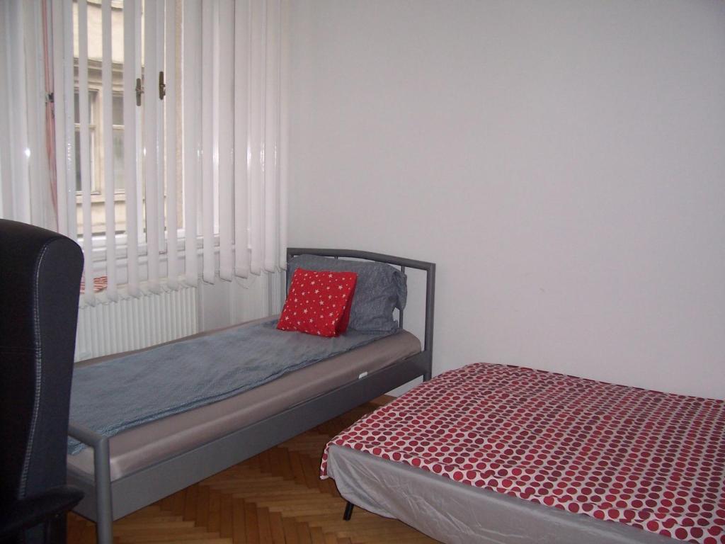 Postel nebo postele na pokoji v ubytování Universal Apartment Budapest