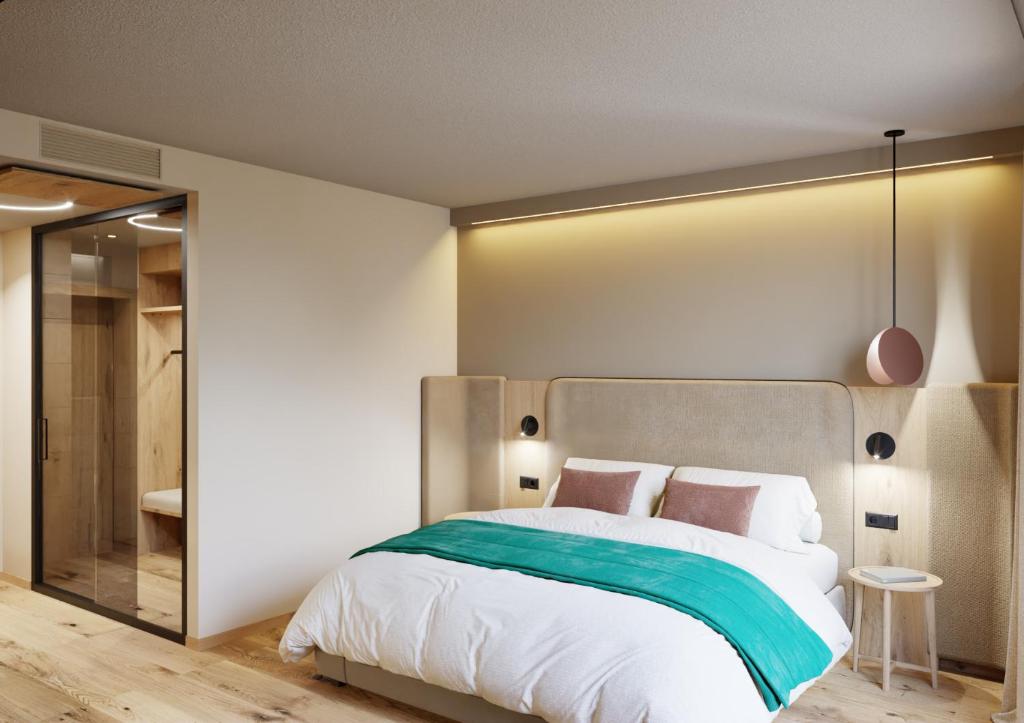 Postel nebo postele na pokoji v ubytování 1A Landhotel Schicklberg