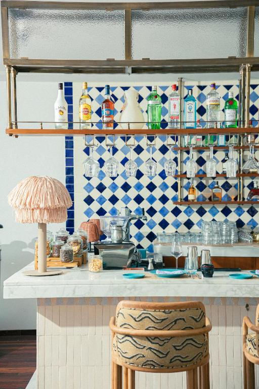 a kitchen with a blue and white tiled wall at Four Seasons Hotel Tunis in Gammarth
