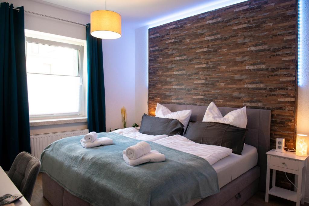 Postel nebo postele na pokoji v ubytování Savor Appartement 5 Personen 2 Schlafzimmer Babybett Netflix Balkon Zentrum