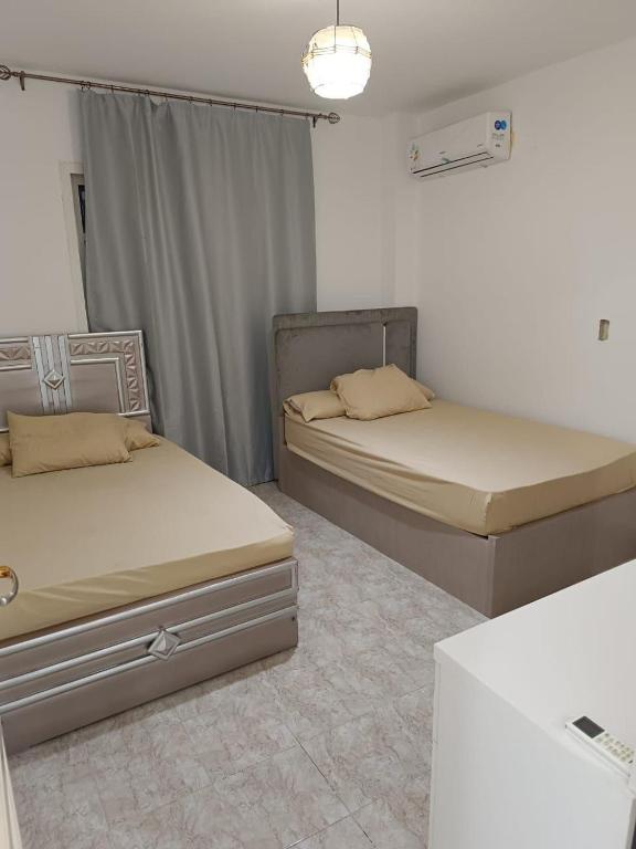 Postel nebo postele na pokoji v ubytování apartment AL1
