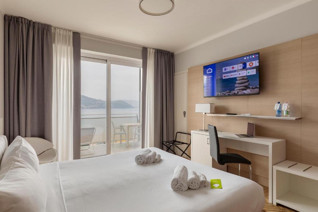 Кровать или кровати в номере B&B Hotels Park Hotel Suisse Santa Margherita Ligure
