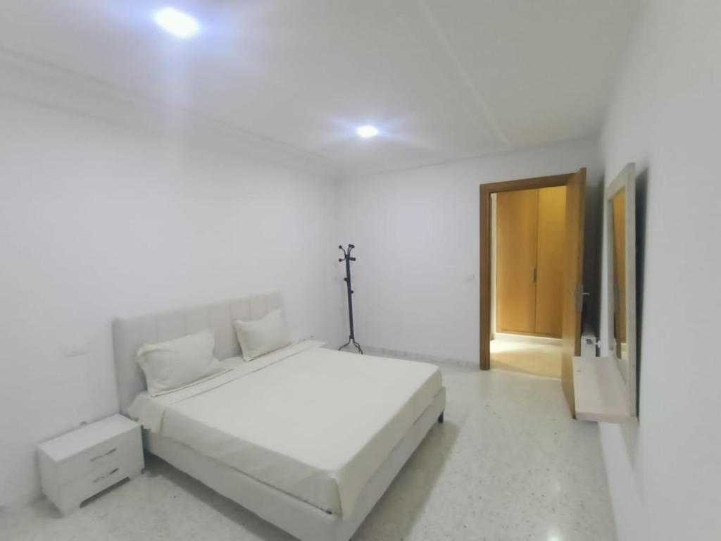 Postel nebo postele na pokoji v ubytování Appartement ergonomique