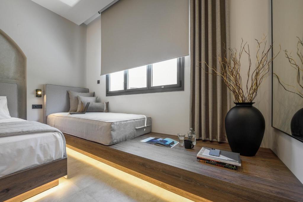 Loena Luxury Suites - 11