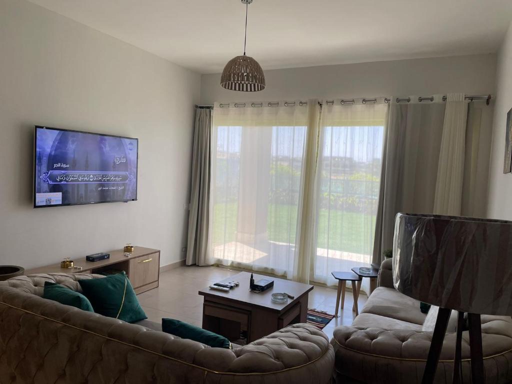 TV a/nebo společenská místnost v ubytování hacienda bay chalet