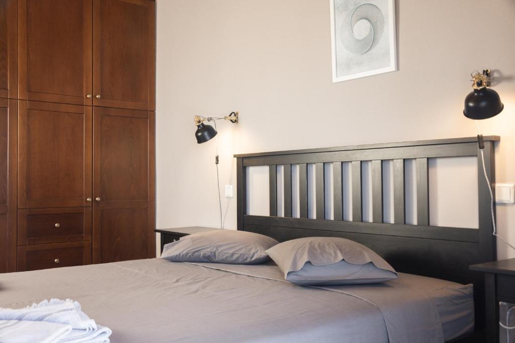 Postel nebo postele na pokoji v ubytování Akrotiri Sea View Maisonette