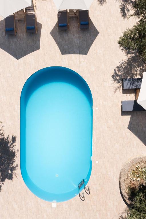Bazén v ubytování Akrotiri Sea View Maisonette nebo v jeho okolí