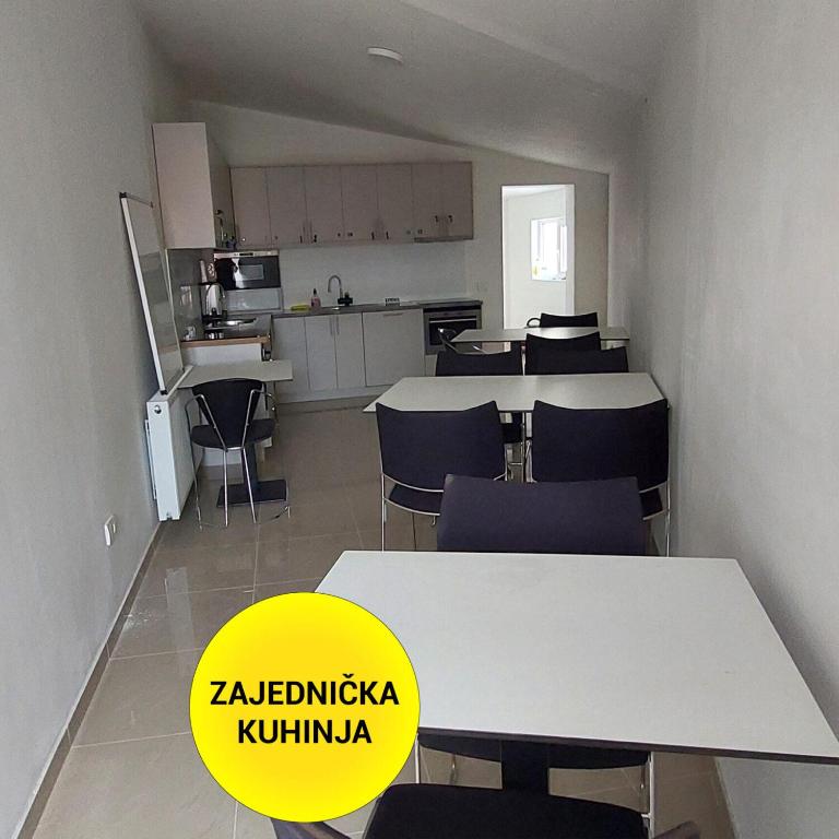 Kuchyň nebo kuchyňský kout v ubytování Fenix Apartments
