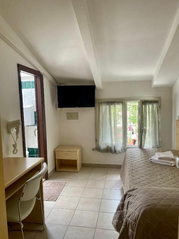 Postel nebo postele na pokoji v ubytování Hotel Adler