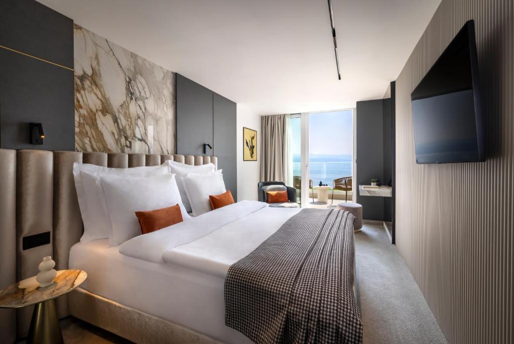 Postel nebo postele na pokoji v ubytování Grand Hotel Adriatic