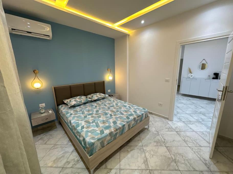 Postel nebo postele na pokoji v ubytování Blue'ming Sousse
