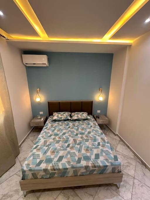 Postel nebo postele na pokoji v ubytování Blue'ming Sousse
