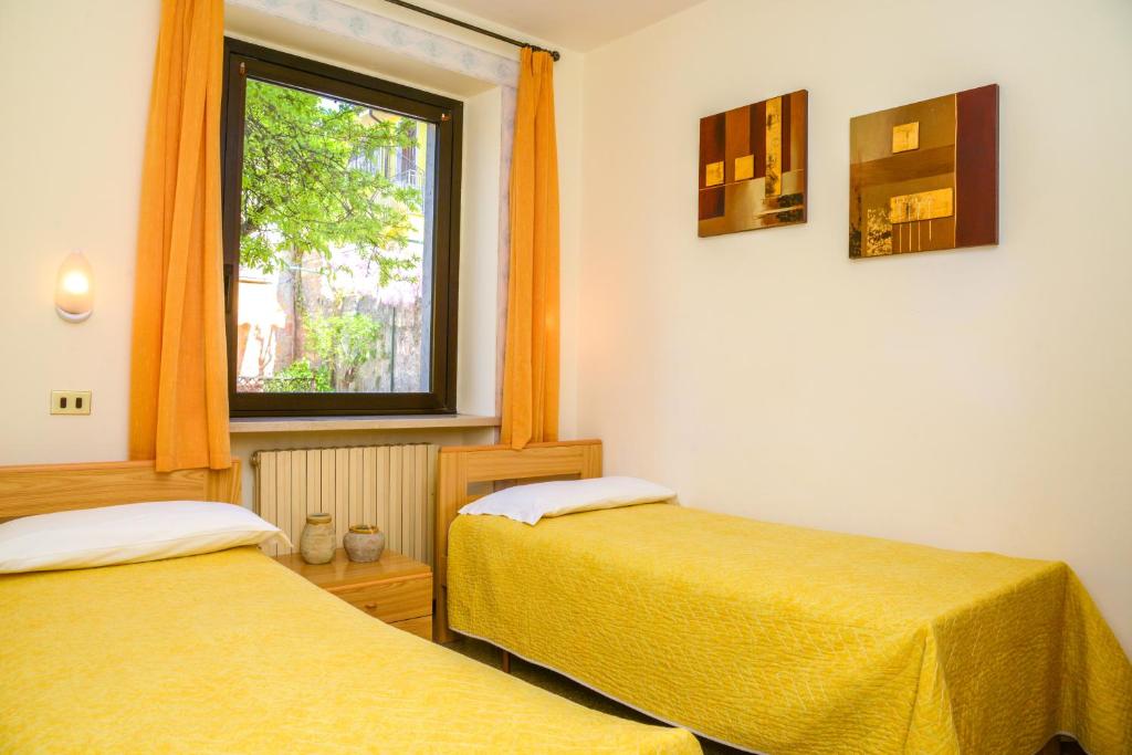 Postel nebo postele na pokoji v ubytování Garni Onda