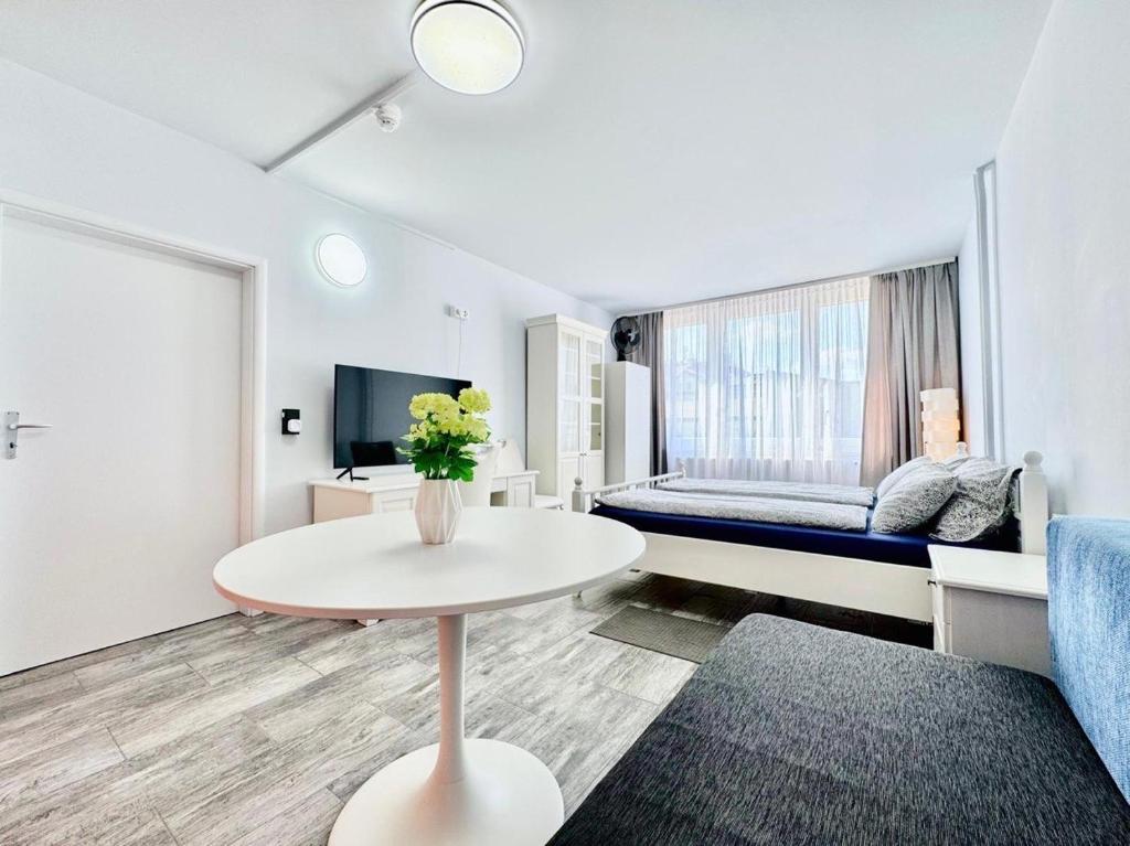 Postel nebo postele na pokoji v ubytování Apartment Střížkov