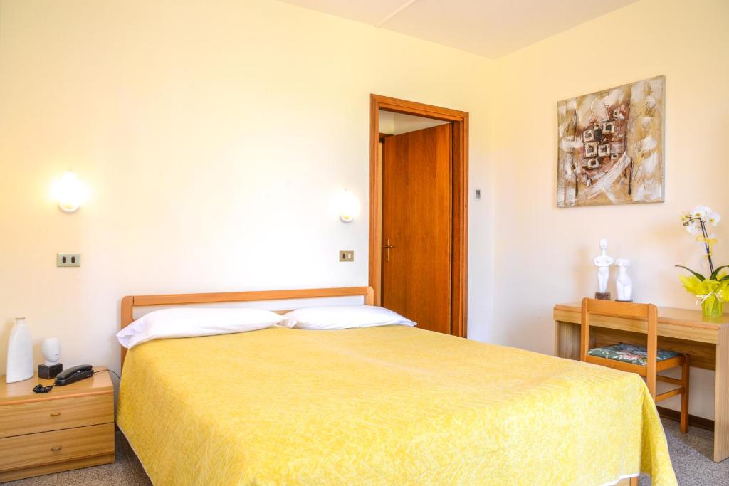 Postel nebo postele na pokoji v ubytování Garni Onda