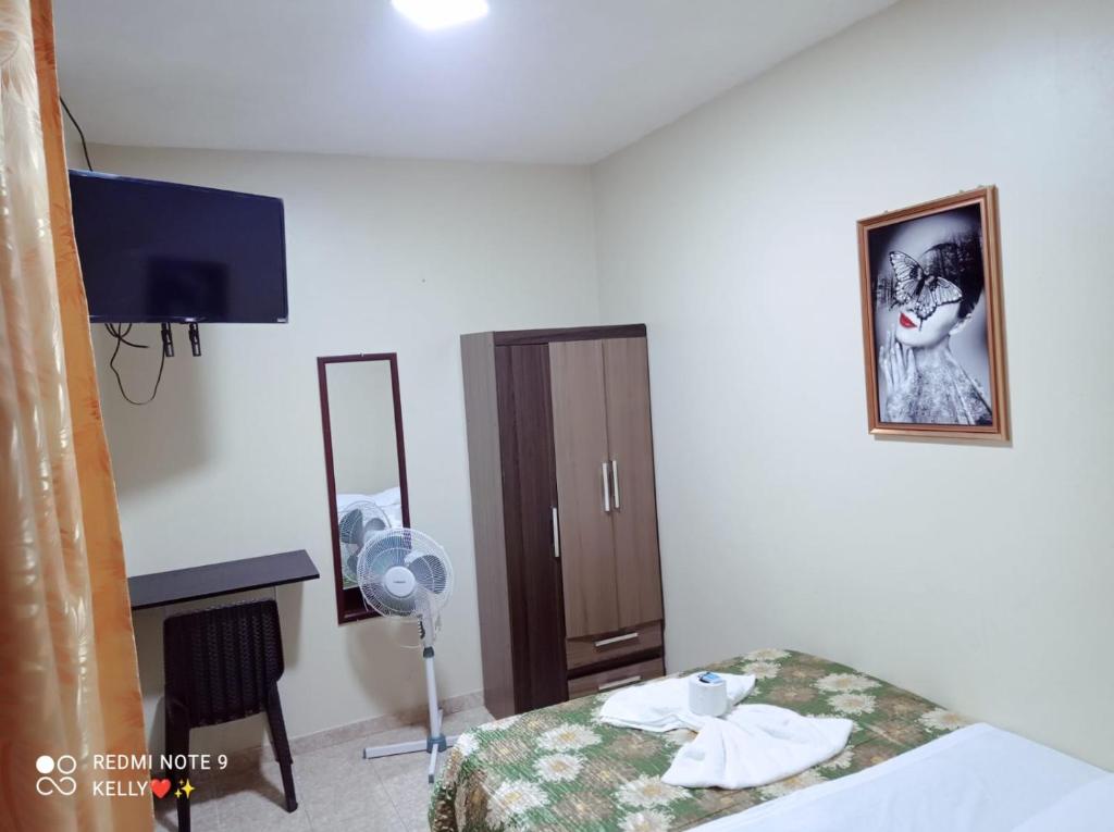 Postel nebo postele na pokoji v ubytování Hostal Real Piura - Oficial