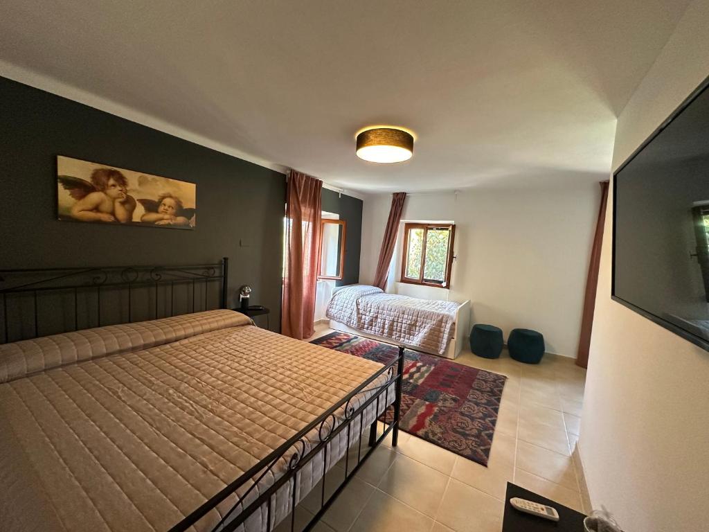 B&B Ronco Oste - Quadruple Room With Private Bathroom