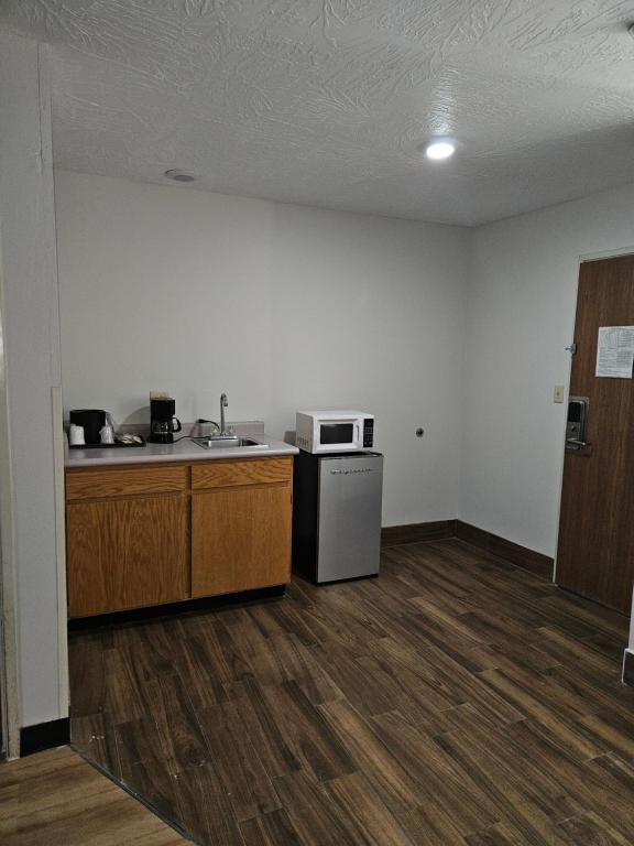 Kuchyň nebo kuchyňský kout v ubytování Hotel Zyva