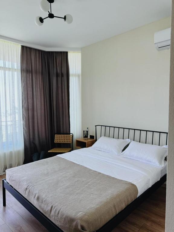 Postel nebo postele na pokoji v ubytování Cozy Rooms with View, Sighnaghi
