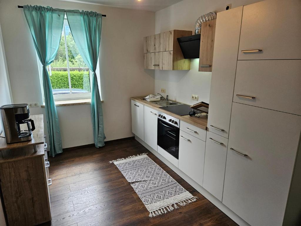 Kuchyň nebo kuchyňský kout v ubytování Wohnung pascal