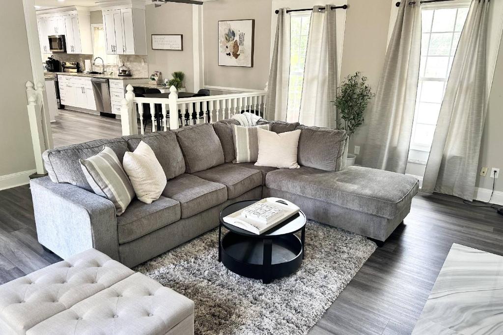 a living room with a couch and a coffee table at Indian Lakes in Stone Mountain