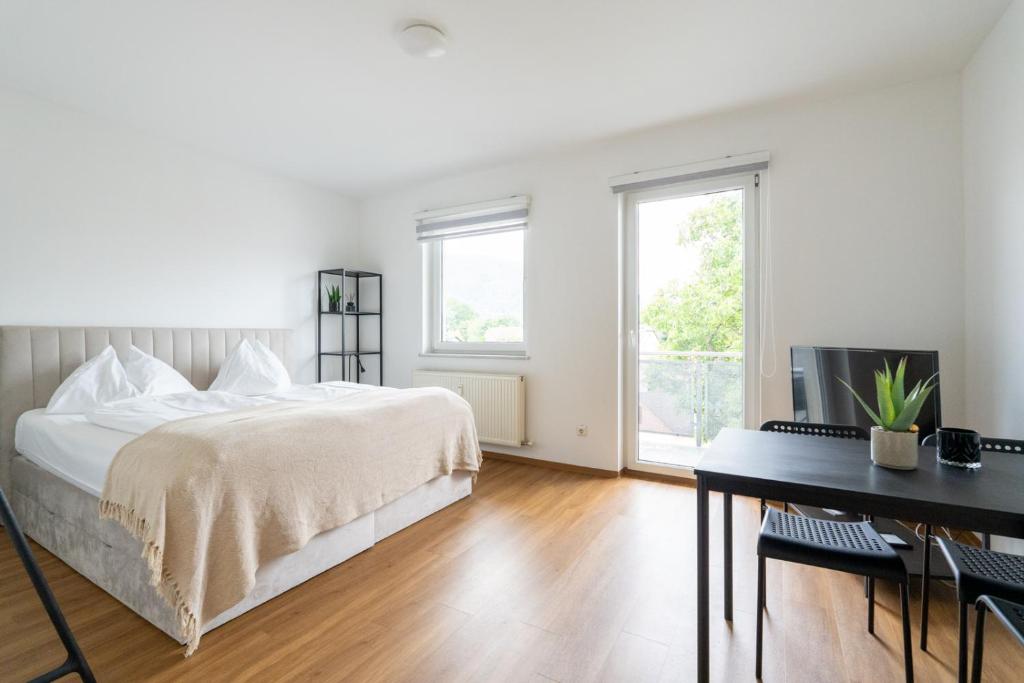 Postel nebo postele na pokoji v ubytování FarawayHomes Studio Graz #10