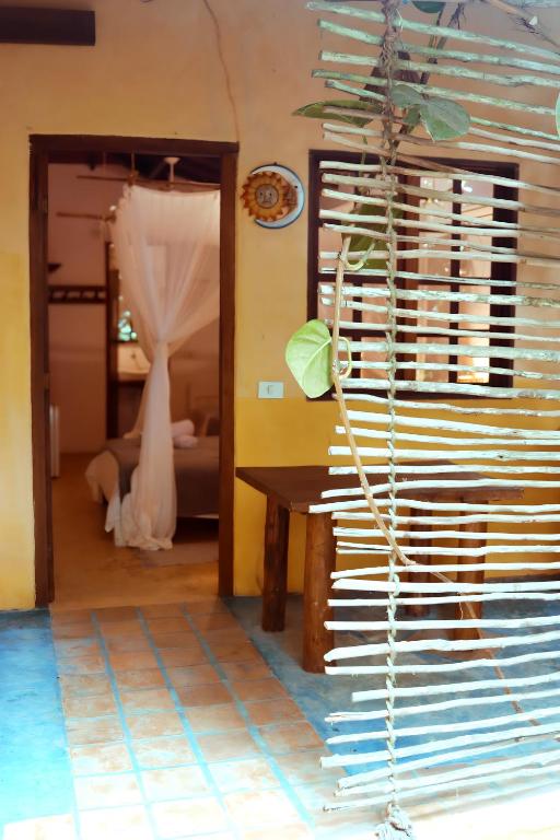 Postel nebo postele na pokoji v ubytování Casa Mangará Trancoso
