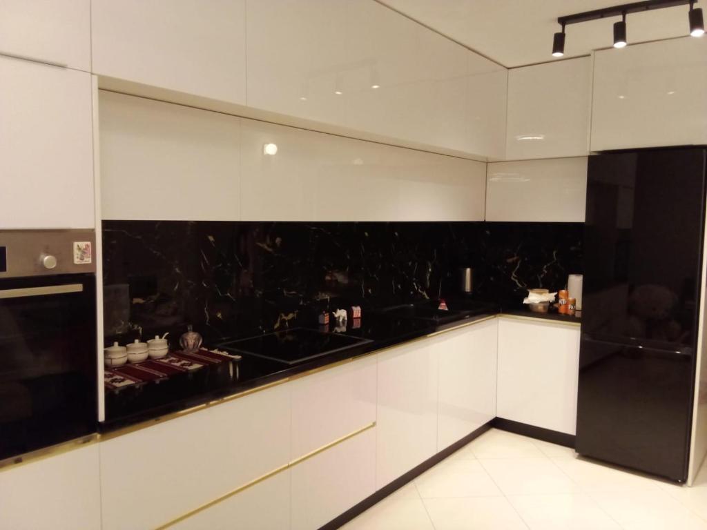 Kuchyň nebo kuchyňský kout v ubytování Stela Apartment