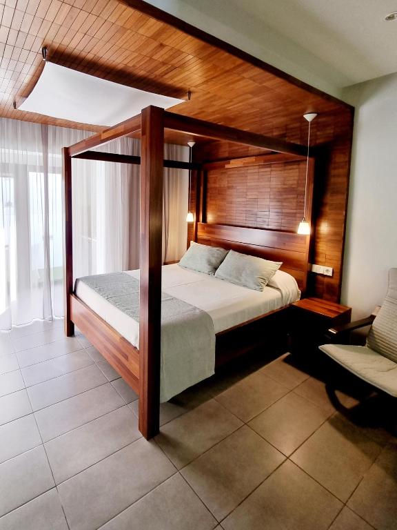 Postel nebo postele na pokoji v ubytování Apartamentos El Arrecife
